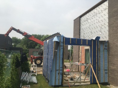 Aanbouw in houtskeletbouw aan een bestaande woning in Pittem
